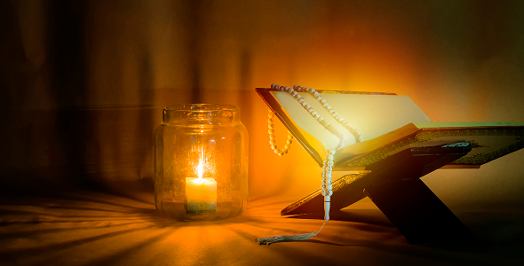Quran and candle